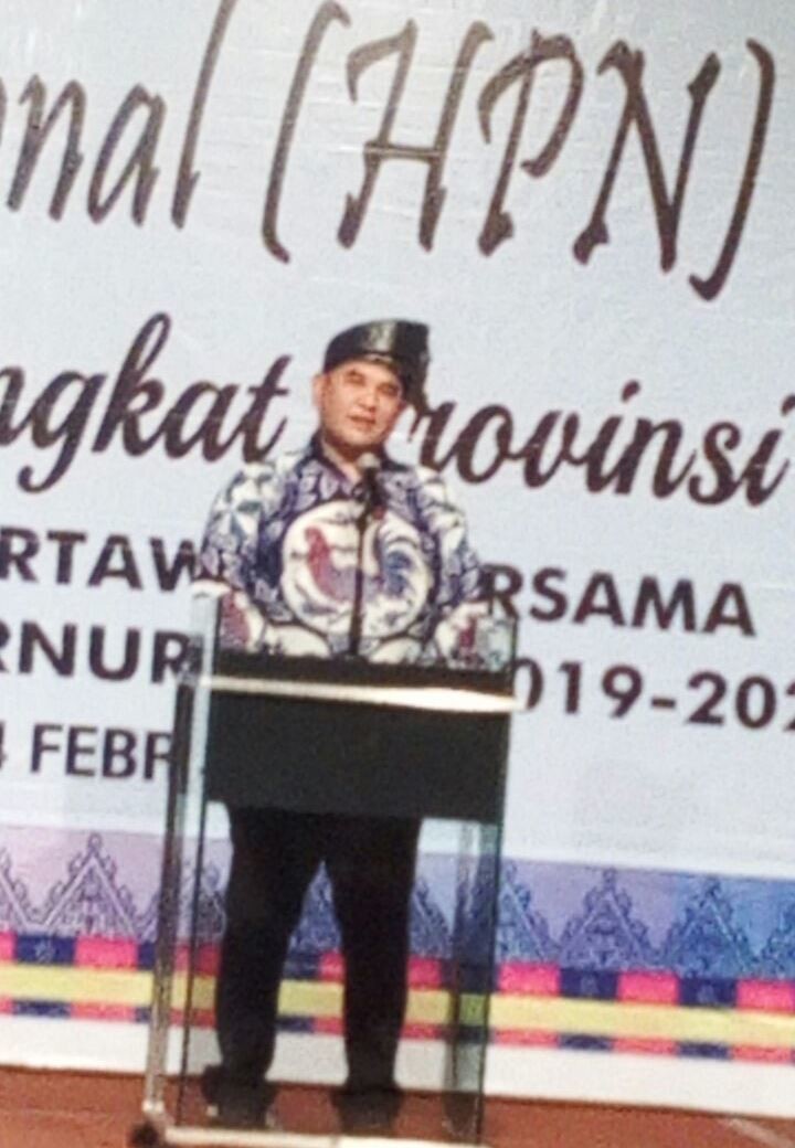 Ketua PWI Riau, Zulmansyah Sekedang saat menyampaikan sambutan di acara HPN 2018