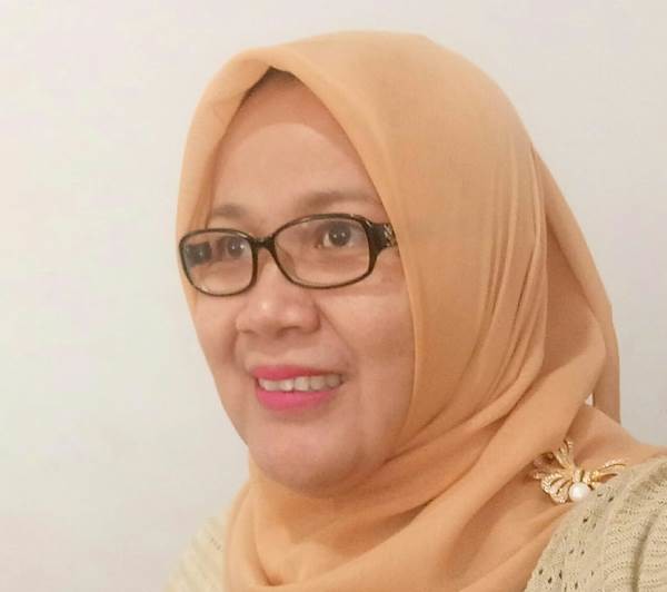 Kepala Sekolah SMPN 6 Pekanbaru, Fitra Yulia Rozi, M Pd