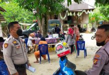 Tim Vaksinator Puskesmas Salo Bersama Anggota Polres Kampar, Gelar Vaksinasi di Kelurahan Pulau Tepi Air Kampar