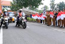 Sekdako Pekanbaru Lepas Tim Satgas Merah Putih, Sebar 10 Ribu Bendera