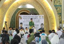 Pj Walikota Pekanbaru Serahkan Secara Simbolis Zakat Bulan November 2022